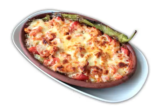 Kiremit Piliç Kaşar / Chicken with Kashar Cheese on the clay tile 