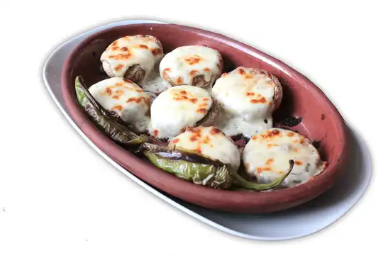 Kiremit Mantar Kaşar / Mushroom with Kashar Cheese on the clay tile
